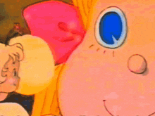 a close up of a cartoon character 's face with blue eyes