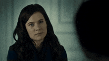 a woman says " i 'm sorry you had to wait " in yellow letters