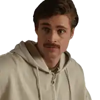 a man with a mustache is wearing a white sweatshirt