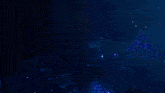 a blue and yellow glowing object with a crown on it