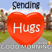 a red heart with the words sending hugs and good morning written on it