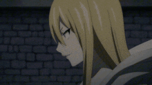 a close up of a blonde anime character against a brick wall