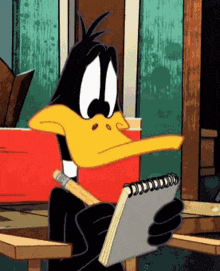 a cartoon duck is writing in a notebook with a pencil
