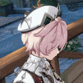 a girl with pink hair wearing a white hat with a star on it