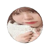 a round mirror shows a person 's reflection in the mirror