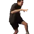 a man in a black shirt and black shorts is dancing on a white background