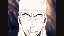 a close up of a man 's face with his eyes closed wearing a white headband .