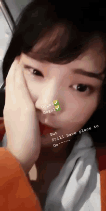 a close up of a girl 's face with a caption that says gogo2 gogol but still have place to go