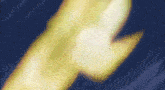 a blurry picture of a person 's hand with a light coming out of it .