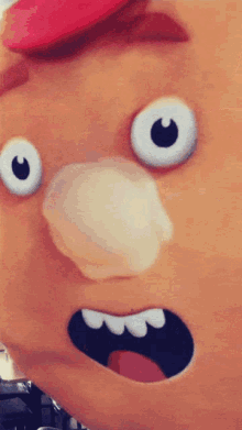 a close up of a cartoon character 's face with a big mouth