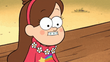 a cartoon character with braces on her teeth is wearing a red sweater with a star on it