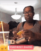 Man Trying To Take Food From Greedy Lady Lady Eating Food GIF - Man Trying To Take Food From Greedy Lady Lady Eating Food I Said I'M Not Sharing GIFs