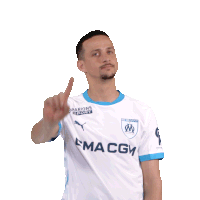 a man wearing a white shirt that says macgm points up