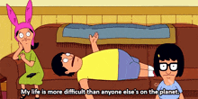 a bob 's burgers cartoon shows a man laying on a couch with the words my life is more difficult than anyone