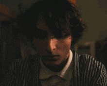 a man in a striped shirt says " he does n't even know "