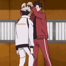 a man in a red jacket has the word fu on his back