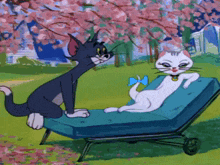 a cartoon of a cat and a cat laying on a lounge chair