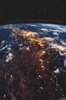 an aerial view of the earth at night with the words banshy on the bottom