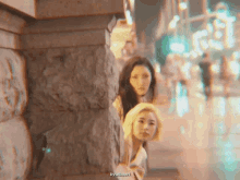 two women are standing next to each other in a blurry photo that says byulboeri on the bottom