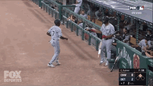 high five tim anderson eloy jim%C3%A9nez chicago white sox white sox vs tigers