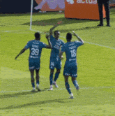 soccer players on a field with one wearing number 33