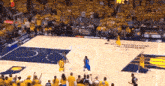 a basketball game is being played on a court sponsored by cambridge fieldhouse