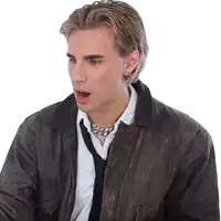 a man wearing a leather jacket and tie looks surprised with his mouth open
