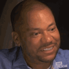 a man wearing a shirt that says bar rescue