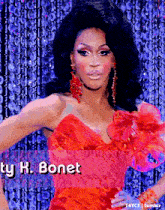 a woman in a red dress with the name jenny r. bonet written on the bottom