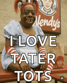 a wendy 's sign is behind a woman in a wendy 's outfit