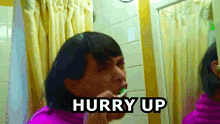 a person brushing their teeth in front of a mirror with the words hurry up written on it