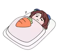 a cartoon girl is sleeping in a bed with a carrot on her blanket .