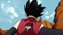 a girl in a red shirt has a symbol on her back that looks like a sword