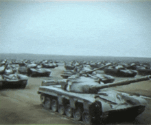a large number of tanks are lined up in a desert