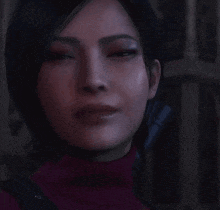 a close up of a woman 's face with a red sweater