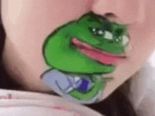 a woman has a frog painted on her face .