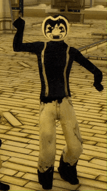 a cartoon character with a smiley face on his head is standing on a brick floor