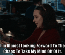 a woman wearing cat ears says i 'm almost looking forward to the chaos