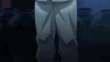 a man in white pants is standing in a dark room with vases in the background