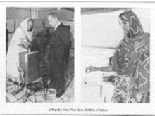a black and white photo of a man and a woman standing next to each other