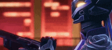 a robot is holding a gun in his hand in a video game .