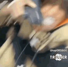 a blurry picture of a person wearing headphones and an oxygen mask .