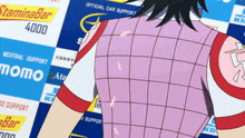 a person in a pink shirt is standing in front of a sign that says stamina bar 4000