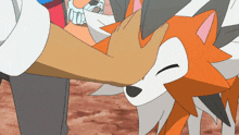 a person is petting an orange and white cartoon animal