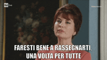 a woman in a red dress says faresti bene a rassegnarti