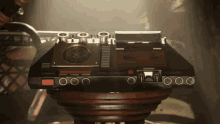 a close up of a device with a red circle on the bottom