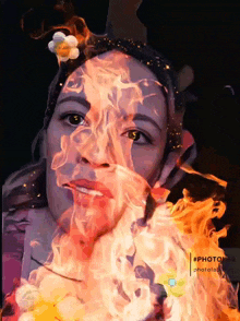 a painting of a woman with flames coming out of her face and the caption #photolab