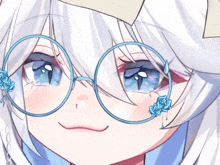 a close up of a girl wearing glasses with blue flowers on her ear