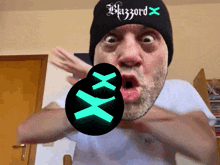 a man wearing a black beanie that says blizzard