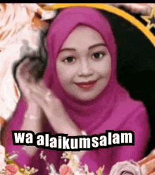 a woman wearing a purple hijab is surrounded by flowers and says wa alaikum salam .